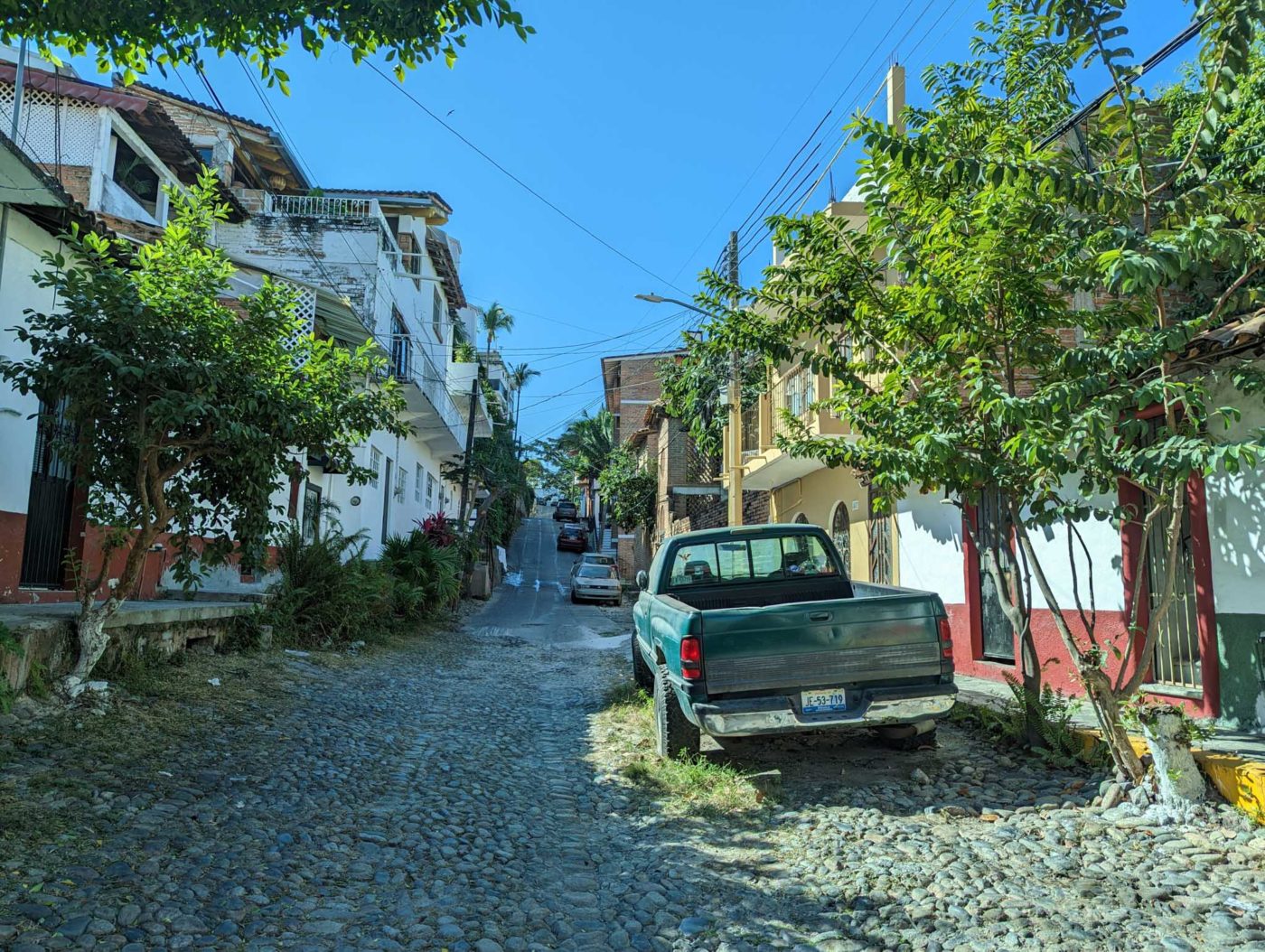 a truck parked on the side of a road.