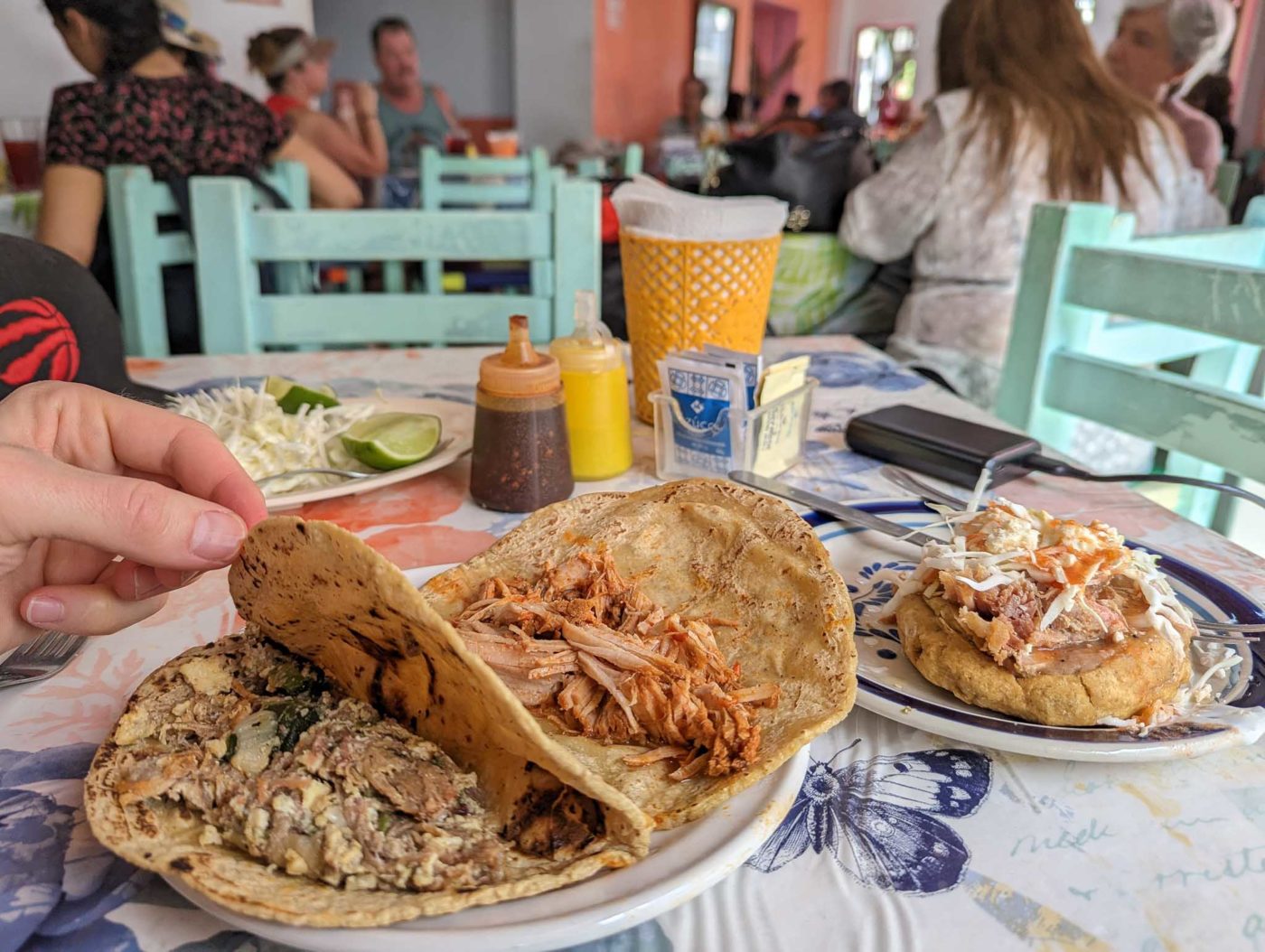 a table with plates of food on it.